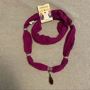 Beautiful wine colored scarf with jewelry accents.